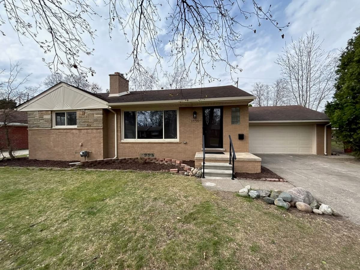 After — renovated home exterior by Done Right Homes